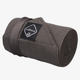 rolled up grey tail bandage with LeMieux branding on a grey background